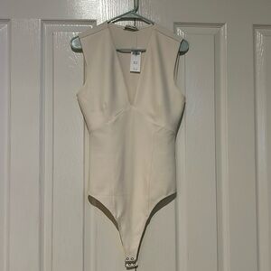 Abercrombie ivory V neckline bodysuit size L